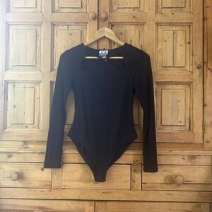 Future Collective by Kahlana Barfield Brown XS Black One Piece Long Sleeve Bodys